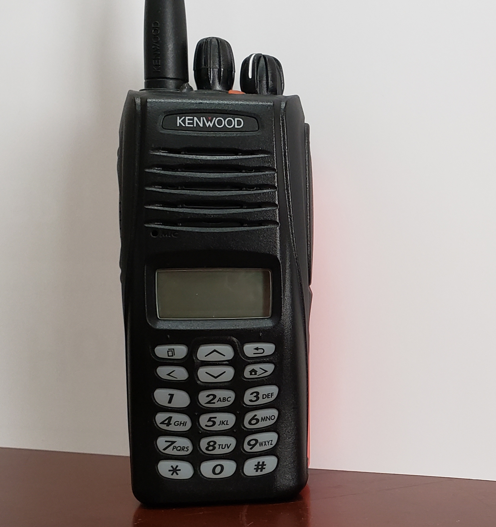 A Kenwood radio that ties into the campus radio network.